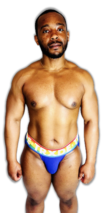 Man wearing a colorful rainbow-patterned underwear on a white background